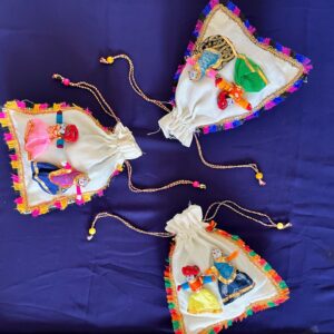 Fabric potli bags with puppet decor (Pack of 12)